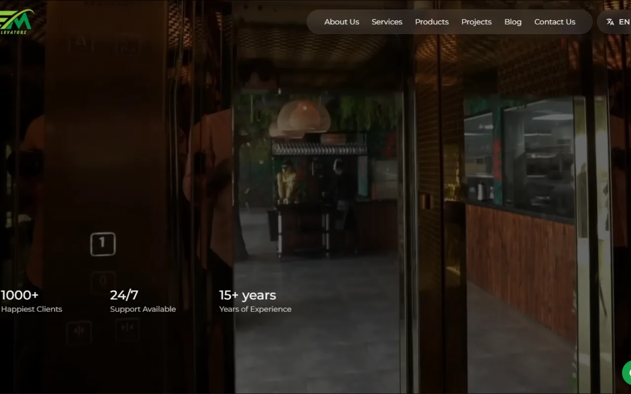 Easy Move Lift home page with a full-screen elevator video and the company menu